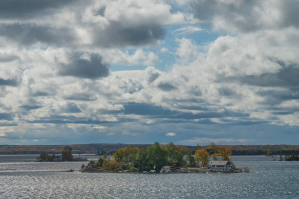 istock Cottage in middle of a Lake 1182327397