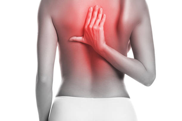 istock Woman with pain in her back 1182328737