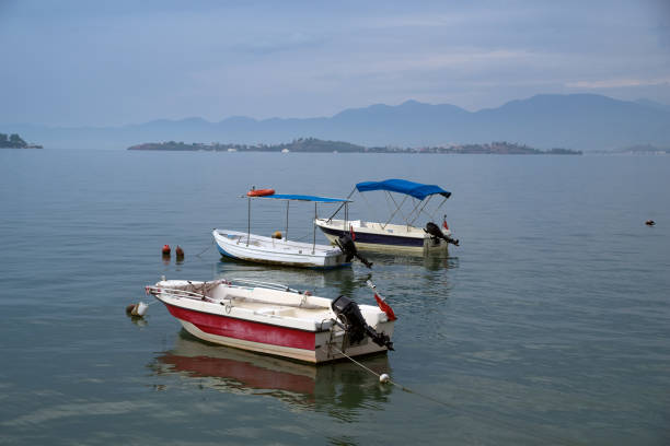 istock Small boats in the bay 1182329081
