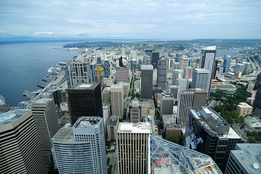 Spectacular View Of Northern Seattle And Elliot Bay On A Cloudy Day With The Sun Peeking
