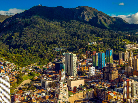 Bogota cityscape with buildings on the streets and buildings in the mountains