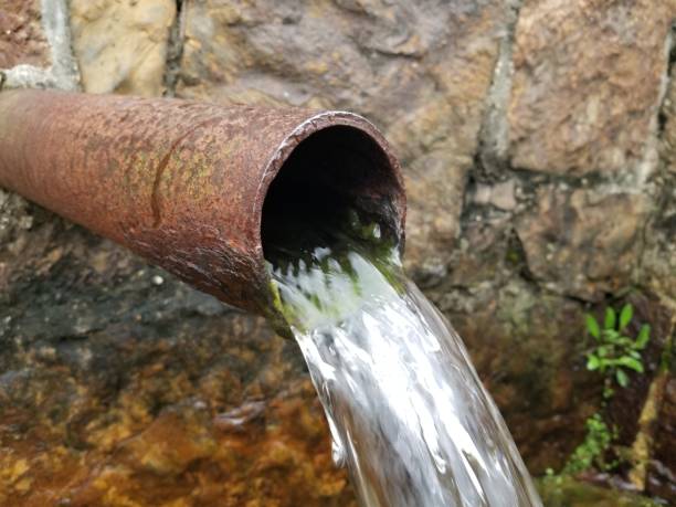 istock Spring Tapped Pipe with water flowing 2 1182341230