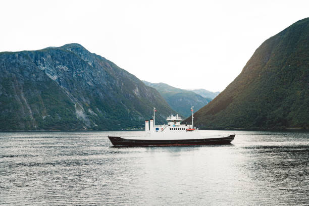 istock Ferry driving over the fjord 1182341589