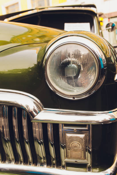 istock Retro styled image of a front of a classic car. 1182341753