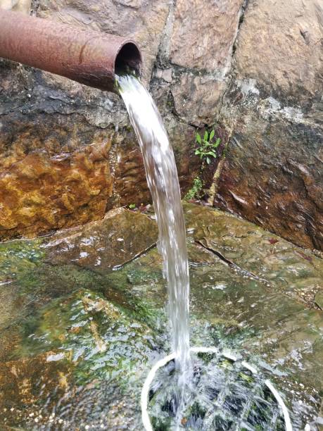istock Spring Tapped Pipe with water flowing 4 1182342062