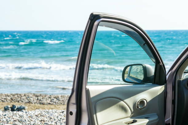 Car door and sea Car door and beautiful seascape cyprus island photos stock pictures, royalty-free photos & images