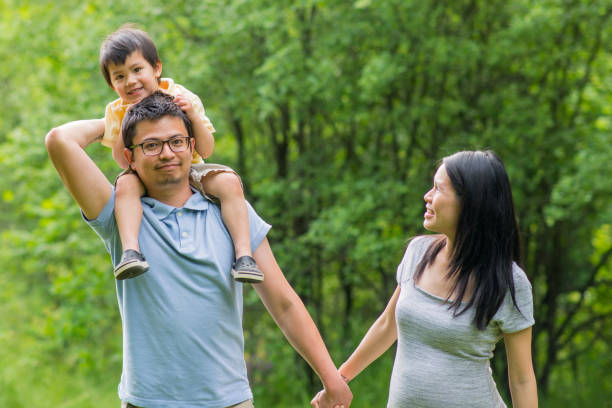 istock Young Family in the Park 1182345250