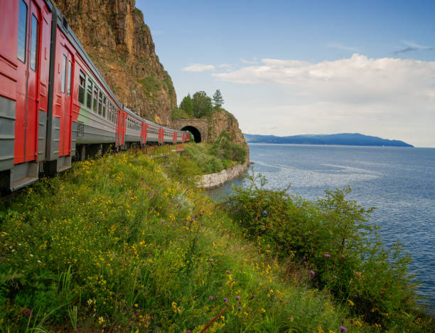 The train enters the tunnel on the Circum-Baikal Railway Lake Baikal in Eastern Siberia, Irkutsk region siberia summer stock pictures, royalty-free photos & images