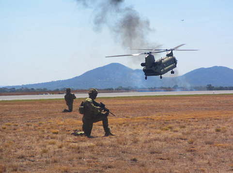 Military armed forces helicopter shot down