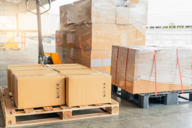 istock Goods pallets shipment at warehouse 1182359264