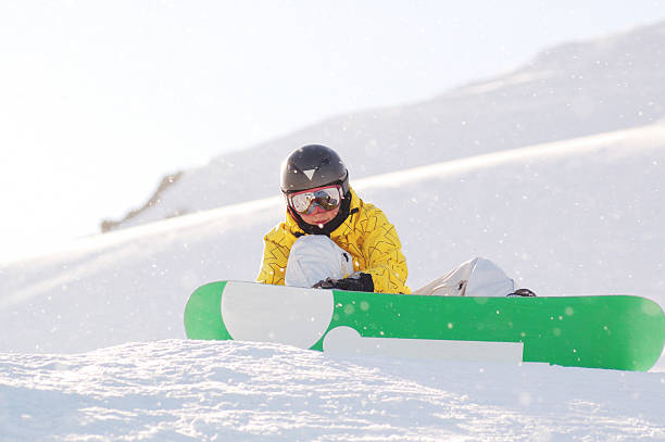 istock young  snowboarder woman 118236295