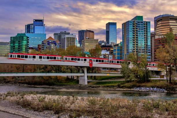 Trains Crossing Over The Bow River