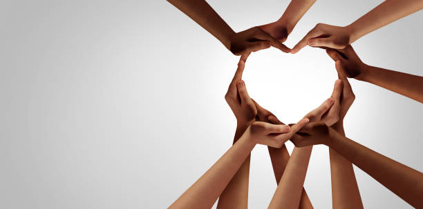 Unity And Diversity Unity and diversity partnership as heart hands in a group of diverse people connected together shaped as a support symbol expressing the feeling of teamwork and togetherness. black culture photos stock pictures, royalty-free photos & images
