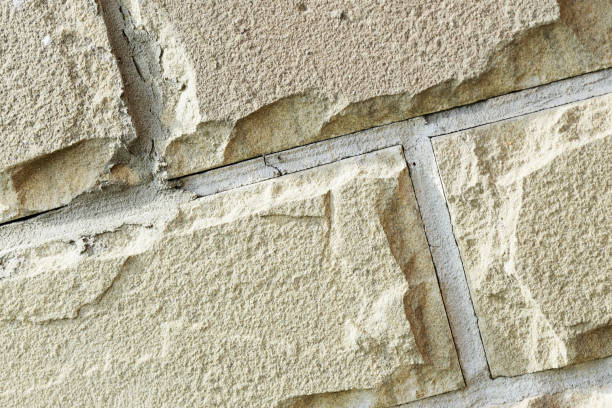 istock Cladding tiles illuminated by the bright sun close up. Abstract background 1182370857