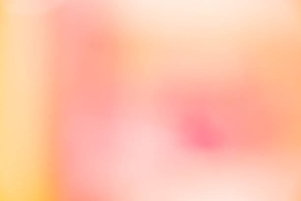 istock Abstract blur light gradient pink and orange soft pastel color wallpaper background. 1182375185