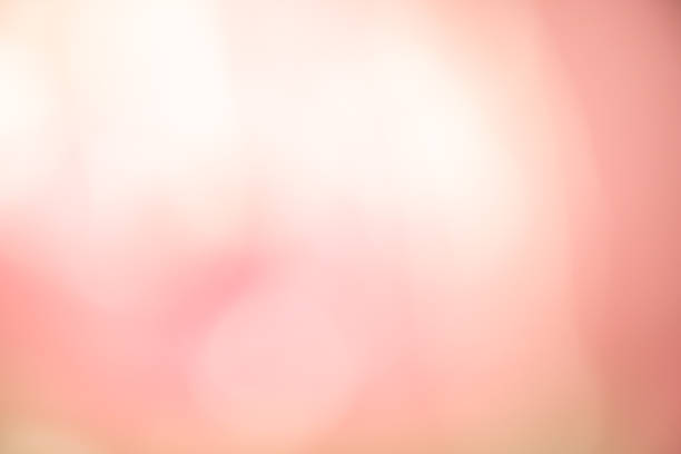 istock Abstract blur light gradient pink and orange soft pastel color wallpaper background. 1182375186