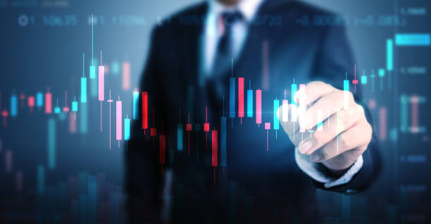 istock Double exposure businessman pointing line dot graph. Technical price candlestick chart graph and indicator stock online trading 1182378294