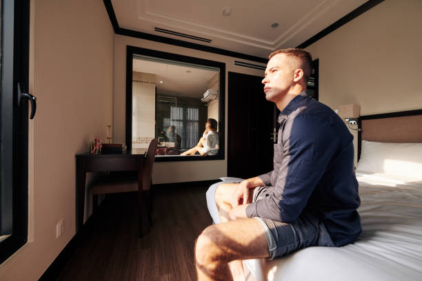 istock Pensive man after argument with wife 1182378365
