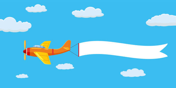 istock Speed airplane aircraft with advertising banner ribbon in the cloudy sky. Vector isolated illustration 1182379377