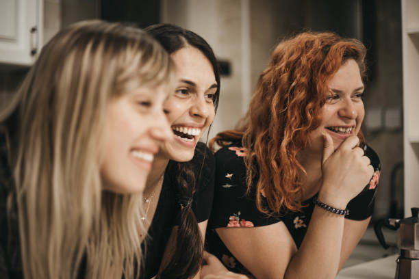 istock Young girls having a house party 1182380944