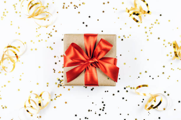 istock Christmas gift box on white sparkling background. 1182381331