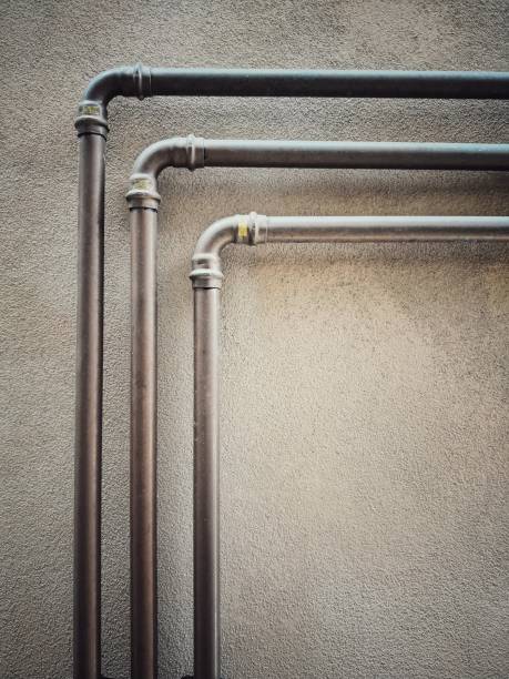 istock Pipes at a 90 degree angle 1182381378