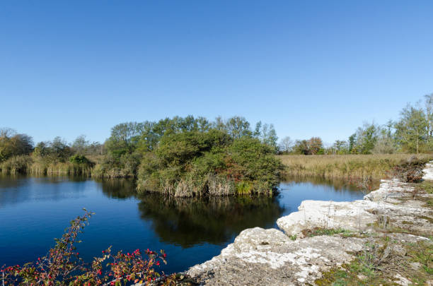 Beautiful lake in an old open stone pit at Albrunna on the swedish island Oland