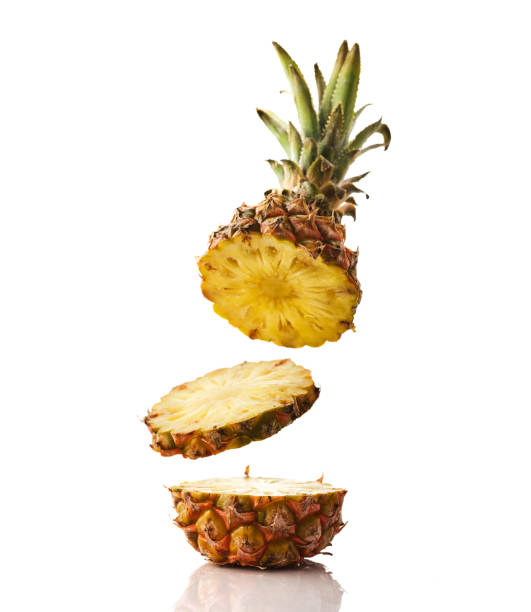 istock Fresh juicy pineaplle flying on white background. Ananas levitation. 1182382450