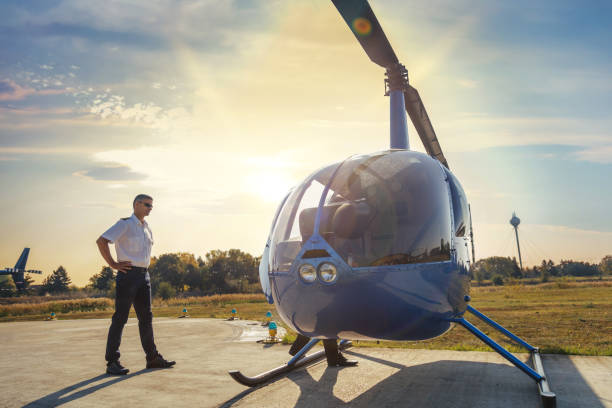 istock Pilots controlling cockpit in helicopter 1182382820