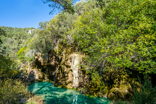 Nacimiento Rio Cuervo river birth waterfalls in Cuenca Serrania of Spain