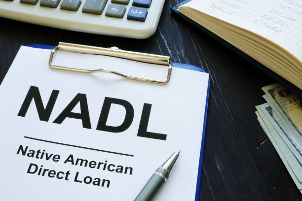 istock Direct loan NADL papers and clipboard. 1182386178