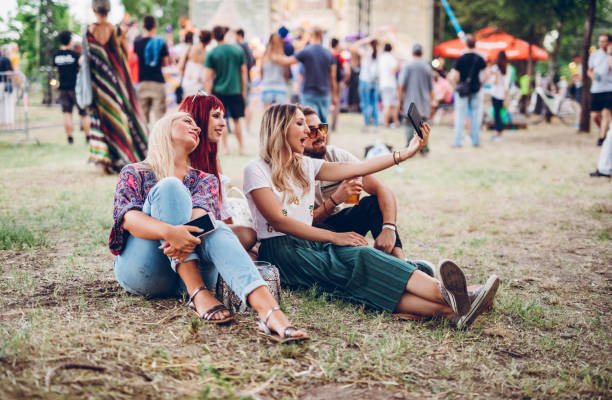 istock Making selfies on a music festival 1182386293