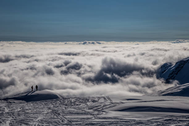 istock Inverse clouds illuminated by the sun in the Alps 1182386409