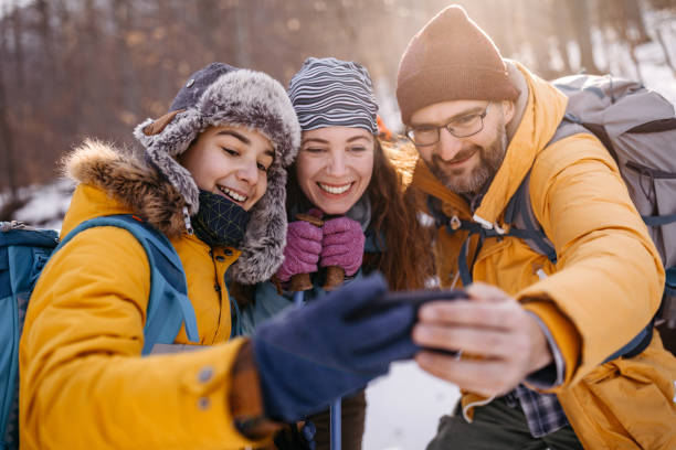 istock Family taking selfie on winter vacation 1182389144