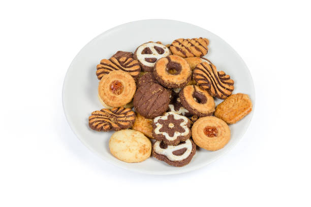 istock Different shortbread cookies on dish on a white background 1182391852