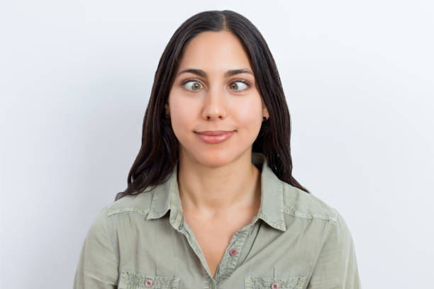 istock Young woman with crossed eye 1182400339