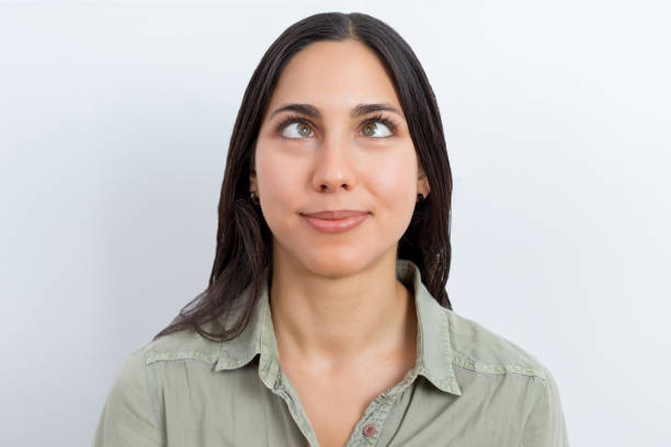 istock Young woman with crossed eye 1182400894