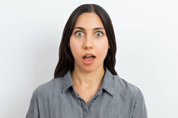 istock Surprised excited young woman 1182401170