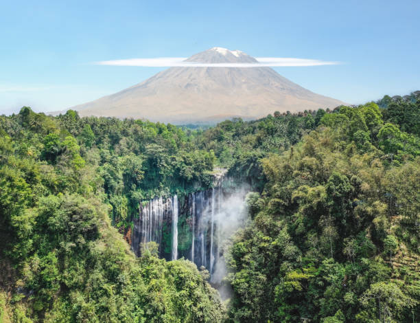 istock Waterfall, volcano and tropical rainforest in Indonesia 1182401208