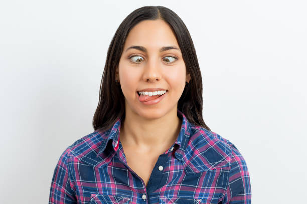 istock Young woman grimacing 1182401536