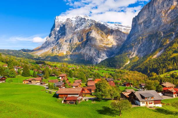 istock Grindelwald, Switzerland village and mountains view 1182403075