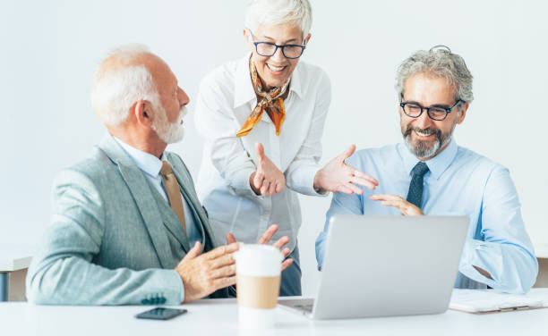 istock Senior business people having a discussion 1182408099