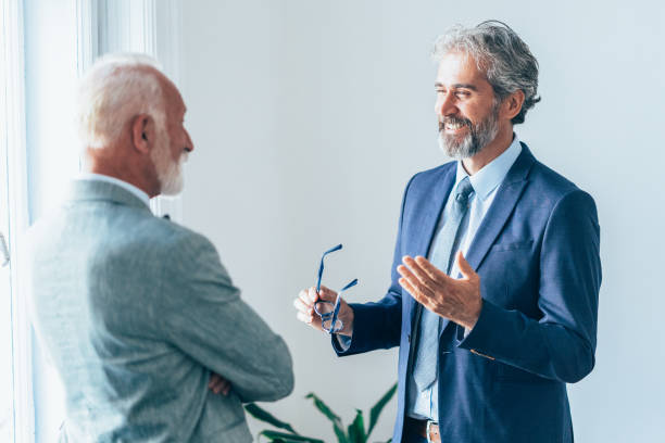 istock Senior business conversation 1182408276