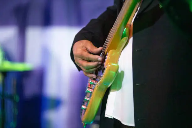 Playing bassguitar on stage