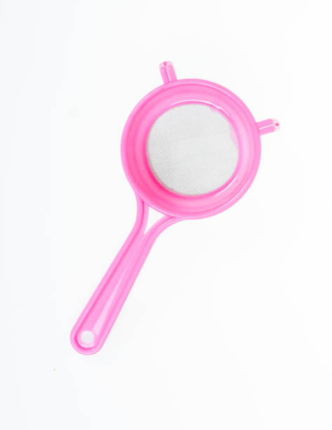 istock Kitchen colander Tool.plastic colander isolated on white background. pink colander 1182415718