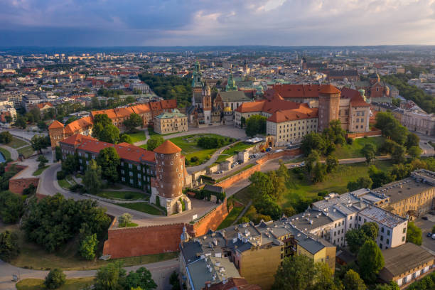 Wawel Royal Castle, Cracow, Poland - 2019.08.03 - aerial view Wawel Royal Castle, Cracow, Poland - 2019.08.03. Casle of polish kings on Wawel Hill in Cracow. Former polish capital old town in morning, calm light of rising summer sun. wawel cathedral photos stock pictures, royalty-free photos & images
