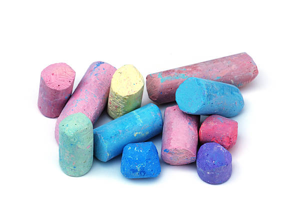 istock Chunks of multi colored chalk in various sizes on white 118241803