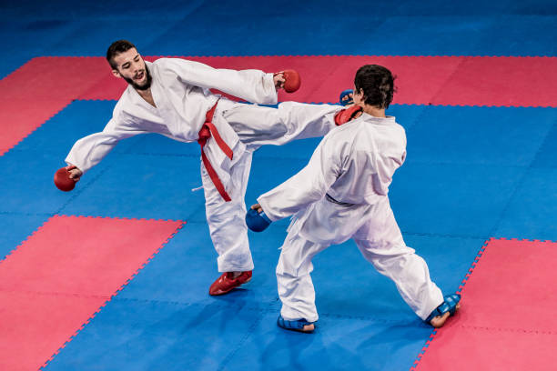 istock Karate players competing during the match 1182419784