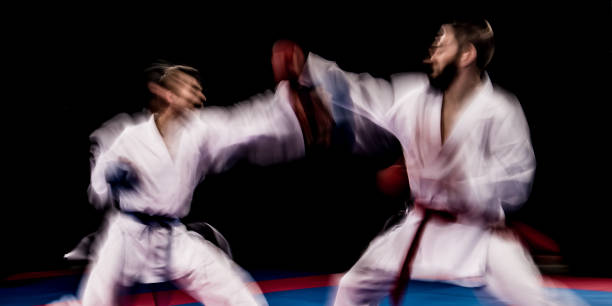 istock Karate players competing during the match 1182419790