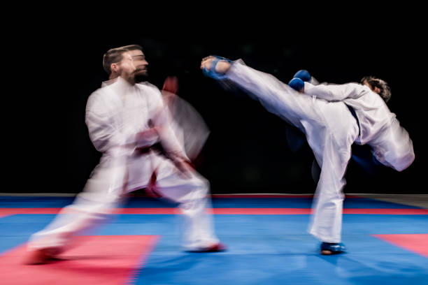 istock Karate players competing during the match 1182419805